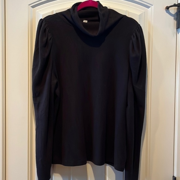 𝅺soft black turtleneck with slight puff shoulder classic
Staple size XXL - Picture 2 of 11